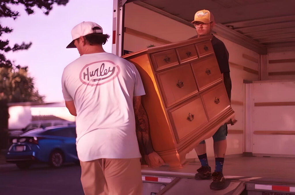 boise moving team carrying a dresser