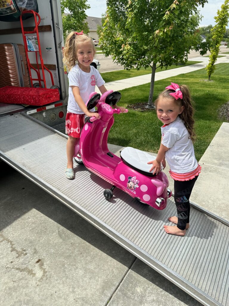 our girls moving stuff on the truck