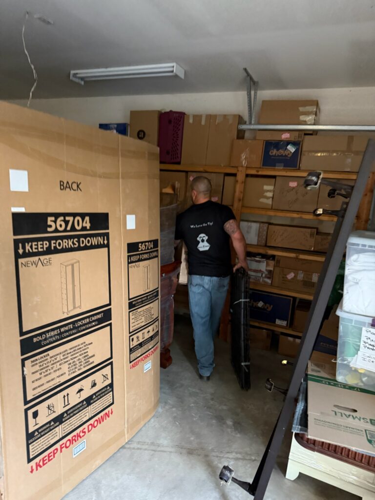 carrying a customers item through the garage area of the home